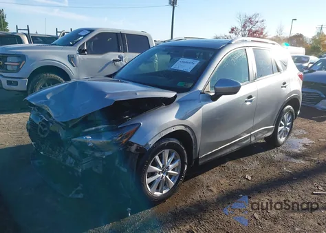 2014 Mazda Cx-5 Touring z USA, uszkodzony, nr VIN JM3KE4CY3E0393283